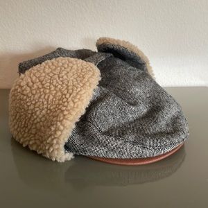Adorable infant newsboy cap with adjustable Velcro chinstrap and Sherpa lining